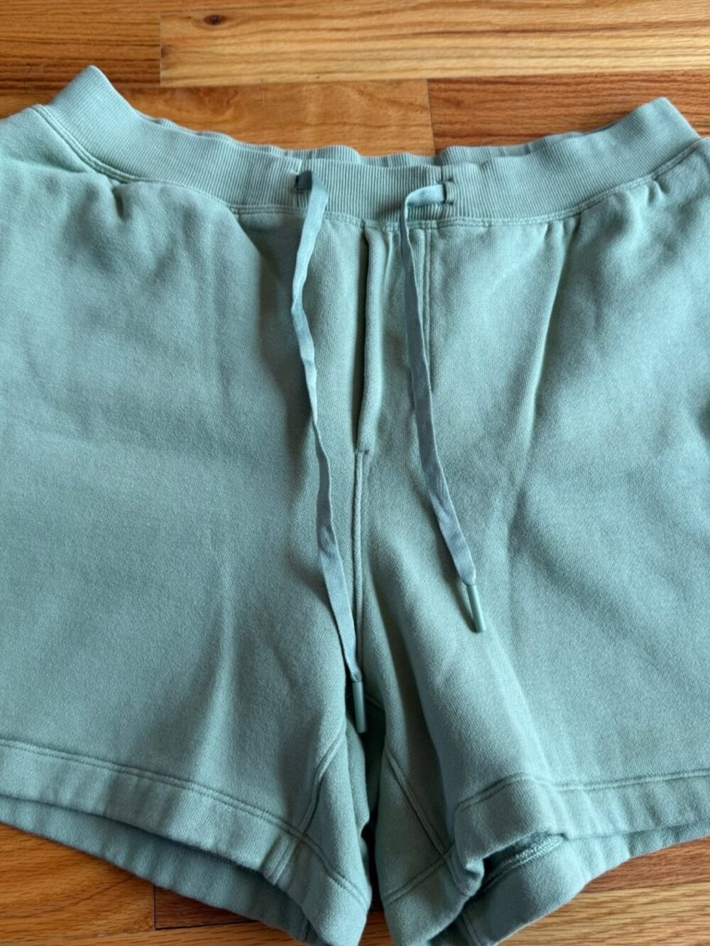 Mens size M LULULEMON fleece shorts in green